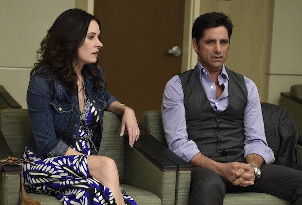 GRANDFATHERED: (L-R) Sara (Paget Brewster) and Jimmy (John Stamos) in the "Pilot" episode of GRANDFATHERED series premier airingTuesday, Sept. 29 (8:00-8:30 PM ET/PT) on FOX. ©2015 Fox Broadcasting Co. CR: Erica Parise/FOX